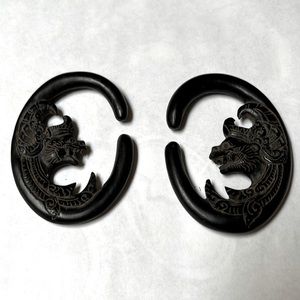 0 gauge carved wood hangers with Tibetan monkey design.